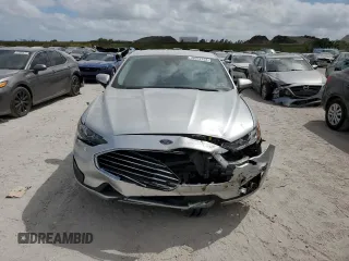 2019 Ford Fusion Hybrid SE with VIN 3FA6P0LUXKR107120, listed as a Copart auction lot 46972153 with 87,197 mi miles. Bid and sale history available at carsss.com. Image 5.