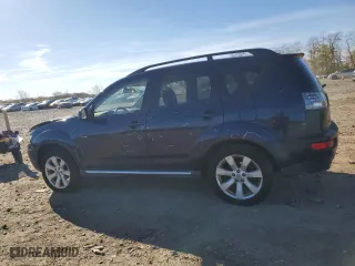 2010 Mitsubishi Outlander XLS with VIN JA4JT4AX2AZ003648, listed as a Copart auction lot 80018994 with 135,872 mi miles and Salvage Title. Bid and sale history available at carsss.com. Image 2.