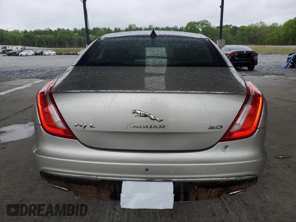 2016 Jaguar XJ Portfolio with VIN SAJWA2G70G8V93006, listed as a Copart auction lot 52324635 with 123,690 mi miles and Salvage Title. Bid and sale history available at DreamBid. Image 6.