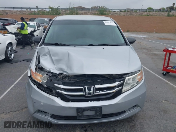 2014 Honda Odyssey LX z VIN 5FNRL5H28EB064426, wystawiony jako IAAI lot #42207634 z przebiegiem 169 706 mil mil oraz . Historia ofert i sprzedaży dostępna na DreamBid. Obrazek 12.