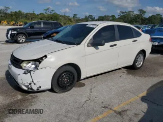 2010 Ford Focus SE with VIN 1FAHP3FN1AW168723, listed as a Copart auction lot 53871655 with 226,703 mi miles and Salvage Title. Bid and sale history available at DreamBid. Image 1.