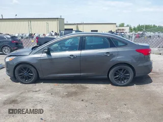 2017 Ford Focus SE with VIN 1FADP3F2XHL235013, listed as a IAAI auction lot 42370565 with 112,276 mi miles and . Bid and sale history available at DreamBid. Image 14.