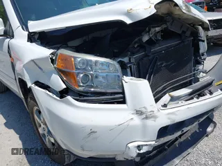 2007 Honda Pilot EX-L with VIN 5FNYF18587B000332, listed as a IAAI auction lot 42403191 with 192,771 mi miles and . Bid and sale history available at DreamBid. Image 17.