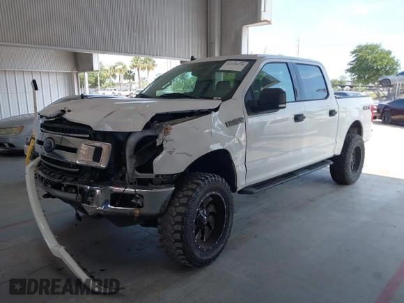 2019 Ford F-150 XL with VIN 1FTEW1E55KFB69767, listed as a IAAI auction lot 42326370 with 143,523 mi miles and . Bid and sale history available at DreamBid. Image 17.