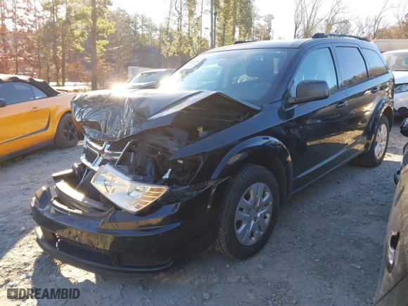 2017 Dodge Journey SE with VIN 3C4PDCABXHT707321, listed as a IAAI auction lot 41614286 with 94,745 mi miles. Bid and sale history available at carsss.com. Image 17.