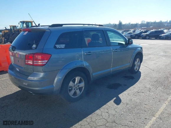 2010 Dodge Journey SXT with VIN 3D4PG5FV3AT146880, listed as a IAAI auction lot 41648379 with 123,341 mi miles. Bid and sale history available at carsss.com. Image 4.
