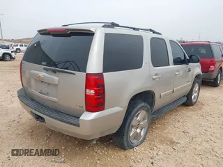 2009 Chevrolet Tahoe 2LT z VIN 1GNFC23039R152640, wystawiony jako IAAI lot #41372840 z przebiegiem 273 428 mil mil oraz . Historia ofert i sprzedaży dostępna na DreamBid. Obrazek 4.