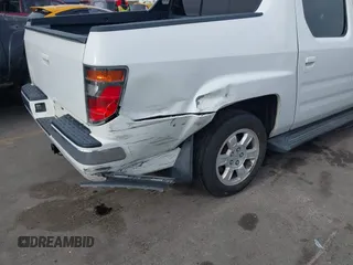 2006 Honda Ridgeline RTL z VIN 2HJYK16586H519593, wystawiony jako IAAI lot #42111678 z przebiegiem 244 962 mil mil oraz . Historia ofert i sprzedaży dostępna na DreamBid. Obrazek 6.