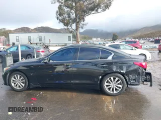 2014 Infiniti Q50 with VIN JN1BV7AP8EM675841, listed as a IAAI auction lot 41582924 with 139,637 mi miles. Bid and sale history available at carsss.com. Image 15.