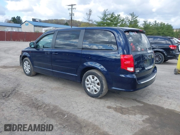 2016 Dodge Grand Caravan SE with VIN 2C4RDGBG4GR146450, listed as a IAAI auction lot 42015145 with 128,725 mi miles. Bid and sale history available at carsss.com. Image 3.