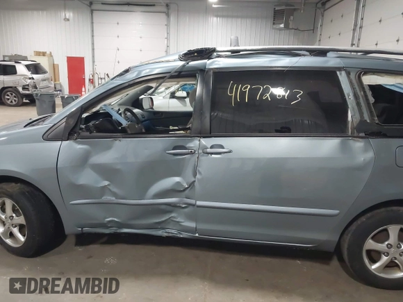 2007 Toyota Sienna CE with VIN 5TDZK23C97S011332, listed as a IAAI auction lot 41972813 with 168,109 mi miles and . Bid and sale history available at DreamBid. Image 14.