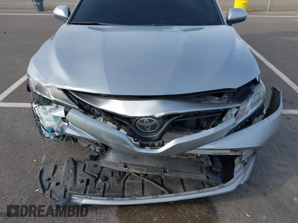 2019 Toyota Camry LE with VIN 4T1B11HK7KU803624, listed as a IAAI auction lot 41589107 with 169,863 mi miles and . Bid and sale history available at DreamBid. Image 6.