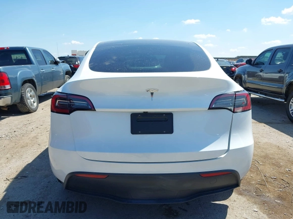 2024 Tesla Model Y with VIN 7SAYGDED0RA327806, listed as a IAAI auction lot 42096752 with 13,244 mi miles and . Bid and sale history available at DreamBid. Image 16.