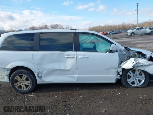 2019 Dodge Grand Caravan SXT with VIN 2C4RDGCG4KR771745, listed as a IAAI auction lot 41859267 with 97,436 mi miles and . Bid and sale history available at DreamBid. Image 6.