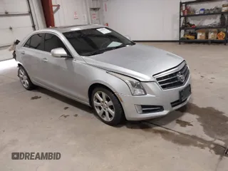 2013 Cadillac ATS Performance z VIN 1G6AJ5S36D0133781, wystawiony jako IAAI lot #42085671 z przebiegiem 96 502 mil mil oraz . Historia ofert i sprzedaży dostępna na DreamBid. Obrazek 1.