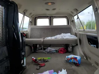 2005 Ford Econoline Wagon XL с VIN 1FBNE31S65HA58474, выставлен на аукционе Copart как лот 55091505 с пробегом 165 333 миль миль и Чистый • Clean title. История ставок и продаж доступна на DreamBid. Изображение 10.