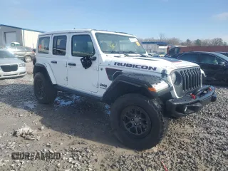 2021 Jeep Wrangler Unlimited Rubicon with VIN 1C4JJXFG1MW849460, listed as a Copart auction lot 45307515 with 54,517 mi miles and Salvage title. Bid and sale history available at DreamBid. Image 4.