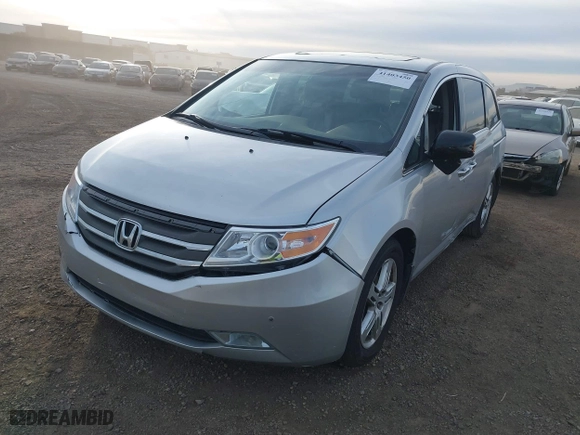 2012 Honda Odyssey Touring with VIN 5FNRL5H96CB095264, listed as a IAAI auction lot 41403450 with 246,199 mi miles. Bid and sale history available at carsss.com. Image 17.