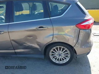 2014 Ford C-Max SEL z VIN 1FADP5BU2EL505043, wystawiony jako IAAI lot #42384560 z przebiegiem 392 782 mil mil oraz . Historia ofert i sprzedaży dostępna na DreamBid. Obrazek 6.