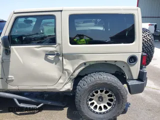 2018 Jeep Wrangler Sahara z VIN 1C4AJWBGXJL811092, wystawiony jako IAAI lot #42305620 z przebiegiem 41 021 mil mil oraz . Historia ofert i sprzedaży dostępna na DreamBid. Obrazek 17.