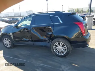 2015 Cadillac SRX z VIN 3GYFNAE32FS543933, wystawiony jako IAAI lot #41578338 z przebiegiem 150 937 mil mil oraz . Historia ofert i sprzedaży dostępna na DreamBid. Obrazek 14.