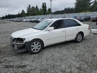 2001 Toyota Avalon XL z VIN 4T1BF28B31U136069, wystawiony jako Copart lot #57355025 z przebiegiem 217 489 mil mil oraz Szkody całkowita. Historia ofert i sprzedaży dostępna na DreamBid. Obrazek 1.