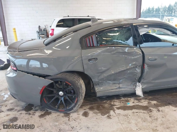 2019 Dodge Charger SXT with VIN 2C3CDXJG2KH547683, listed as a IAAI auction lot 41232974 with 75,960 mi miles. Bid and sale history available at carsss.com. Image 6.