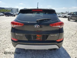 2017 Hyundai Tucson Value z VIN KM8J33A25HU285145, wystawiony jako Copart lot #53126025 z przebiegiem 89 912 mil mil oraz Szkoda całkowita • Salvage title. Historia ofert i sprzedaży dostępna na DreamBid. Obrazek 6.