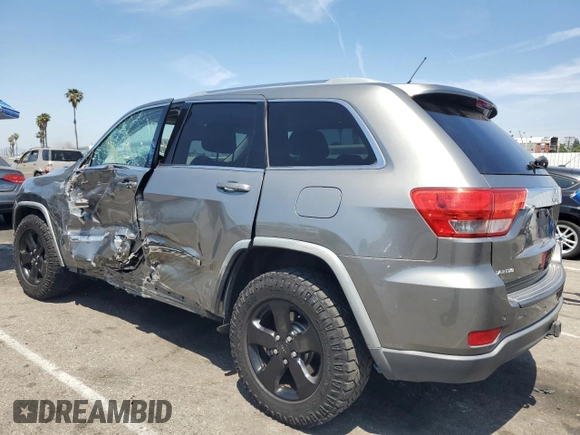 2012 Jeep Grand Cherokee Laredo with VIN 1C4RJEAG0CC104004, listed as a Copart auction lot 53734675 with 150,216 mi miles and Salvage Title. Bid and sale history available at carsss.com. Image 2.