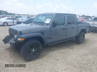 2023 Jeep Gladiator Sport S с VIN 1C6HJTAG7PL522721, выставлен на аукционе IAAI как лот 42594463 с пробегом 64 702 миль миль и . История ставок и продаж доступна на DreamBid. Изображение 18.