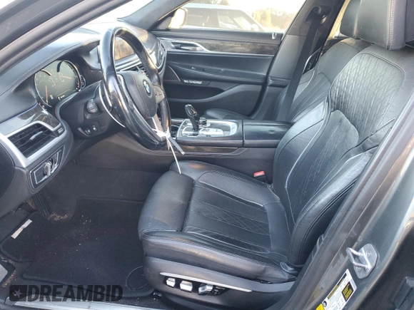 2017 BMW 7 Series with VIN WBA7F2C32HG422866, listed as a Copart auction lot 76177184 with 146,565 mi miles and Salvage Title. Bid and sale history available at DreamBid. Image 7.