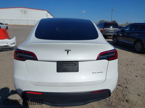 2023 Tesla Model Y Long Range with VIN 7SAYGAEE1PF828338, listed as a IAAI auction lot 40978725 with Not Provided miles and . Bid and sale history available at DreamBid. Image 17.