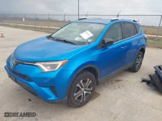 2016 Toyota RAV4 LE with VIN 2T3BFREVXGW420144, listed as a IAAI auction lot 41533171 with 57,002 mi miles. Bid and sale history available at carsss.com. Image 2.