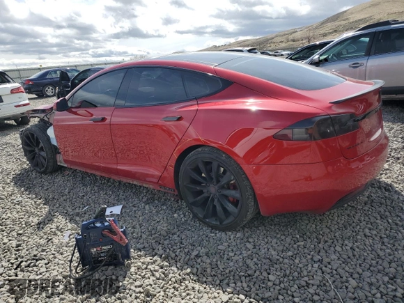 2016 Tesla Model S 90D with VIN 5YJSA1E43GF141843, listed as a Copart auction lot 51788965 with 59,744 mi miles and Salvage Title. Bid and sale history available at DreamBid. Image 2.