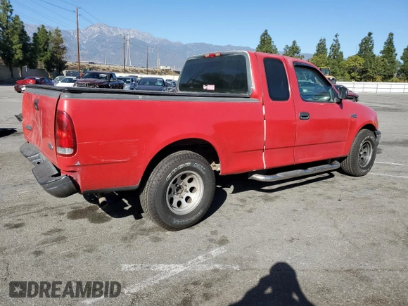 2000 Ford F-150 XL with VIN 1FTZX1721YNA67771, listed as a Copart auction lot 41439795 with 0 mi miles and Salvage Title. Bid and sale history available at carsss.com. Image 3.