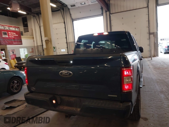2018 Ford F-150 XL with VIN 1FTEW1EPXJKE93689, listed as a IAAI auction lot 41710693 with 117,065 mi miles. Bid and sale history available at carsss.com. Image 16.