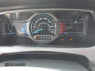 2014 Ford Taurus SHO with VIN 1FAHP2KT8EG131067, listed as a IAAI auction lot 42102086 with 107,822 mi miles. Bid and sale history available at carsss.com. Image 7.