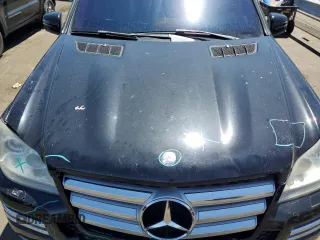 2010 Mercedes-Benz GL-Class GL 550 with VIN 4JGBF8GE1AA561709, listed as a Copart auction lot 65414554 with 156,777 mi miles and Salvage Title. Bid and sale history available at carsss.com. Image 12.