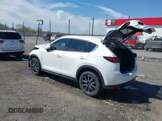2018 Mazda CX-5 Grand Touring with VIN JM3KFBDM0J0404635, listed as a IAAI auction lot 41883068 with 71,178 mi miles. Bid and sale history available at carsss.com. Image 3.