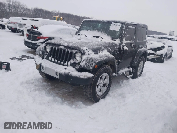 2014 Jeep Wrangler Sahara with VIN 1C4AJWBG3EL190302, listed as a IAAI auction lot 41299284 with 112,476 mi miles and . Bid and sale history available at DreamBid. Image 2.