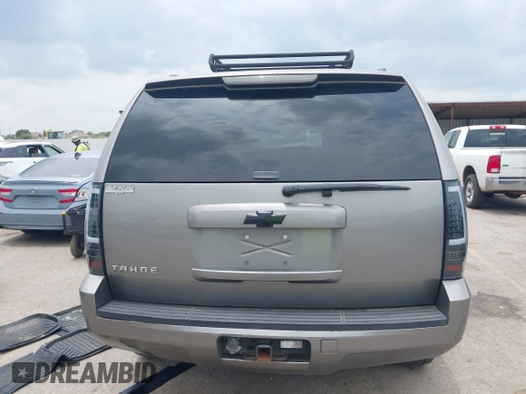 2007 Chevrolet Tahoe LS with VIN 1GNFC13C57R279441, listed as a IAAI auction lot 42428981 with 229,827 mi miles and . Bid and sale history available at DreamBid. Image 17.