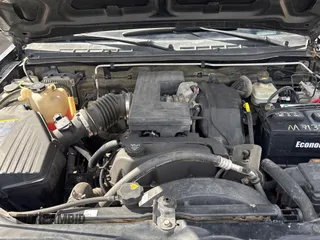 2005 GMC Canyon SLE Z71 z VIN 1GTDS196658185821, wystawiony jako Copart lot #56483455 z przebiegiem 230 072 mil mil oraz Tytuł czysty. Historia ofert i sprzedaży dostępna na DreamBid. Obrazek 7.