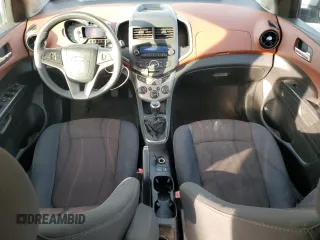 2012 Chevrolet Sonic LT with VIN 1G1JD5SH0C4231267, listed as a Copart auction lot 82848544 with 115,159 mi miles and Salvage title. Bid and sale history available at DreamBid. Image 8.