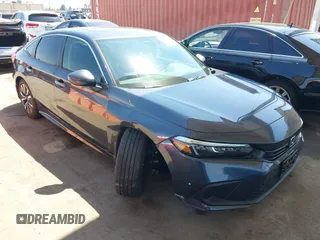 2023 Honda Civic EX with VIN 2HGFE1F74PH316031, listed as a IAAI auction lot 42662933 with 23,262 mi miles and . Bid and sale history available at DreamBid. Image 1.