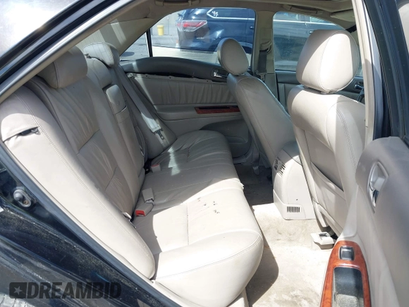 2003 Toyota Camry LE with VIN JTDBF32K730110278, listed as a IAAI auction lot 42033321 with 287,996 mi miles. Bid and sale history available at carsss.com. Image 8.