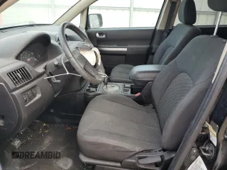 2010 Mitsubishi Endeavor LS with VIN 4A4JM2AS0AE011338, listed as a Copart auction lot 83211414 with 104,582 mi miles and Salvage Title. Bid and sale history available at carsss.com. Image 7.