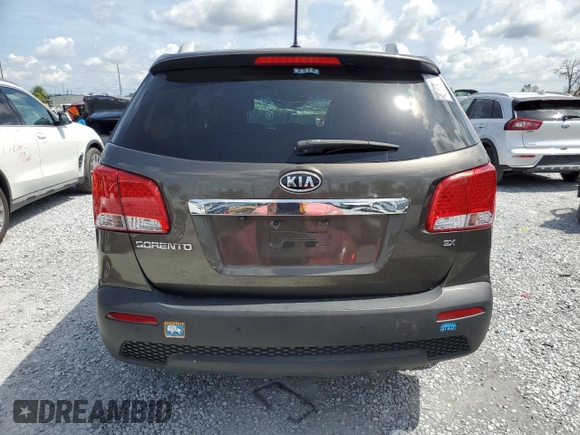 2012 Kia Sorento EX with VIN 5XYKU3A67CG273792, listed as a Copart auction lot 63869745 with Not provided miles and Salvage title. Bid and sale history available at DreamBid. Image 6.