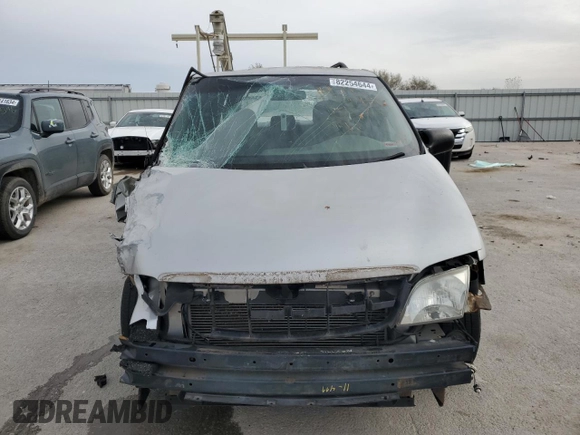 2004 Chevrolet Venture LS z VIN 1GNDX03E44D179265, wystawiony jako Copart lot #82254644 z przebiegiem Nie podano mil oraz Szkody całkowita. Historia ofert i sprzedaży dostępna na DreamBid. Obrazek 5.