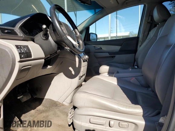 2012 Honda Odyssey EX-L with VIN 5FNRL5H62CB015738, listed as a Copart auction lot 47268455 with 150,924 mi miles and Salvage Title. Bid and sale history available at DreamBid. Image 7.