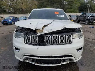2021 Jeep Grand Cherokee Overland with VIN 1C4RJFCG1MC671472, listed as a Copart auction lot 86326714 with 103,760 mi miles and Salvage Title. Bid and sale history available at carsss.com. Image 5.